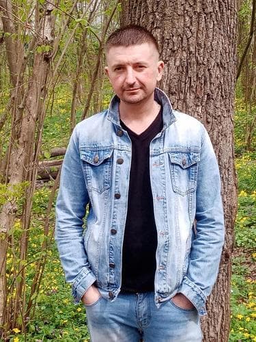 Николай