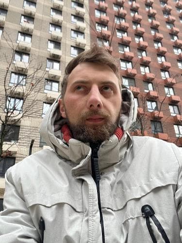 Николай