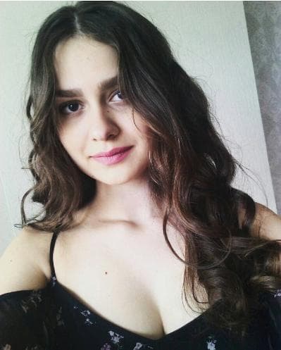 Оля